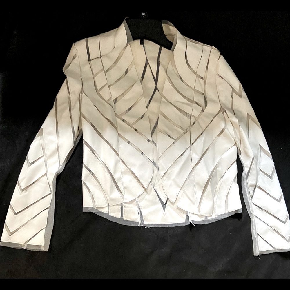 White geometric jacket on white mesh